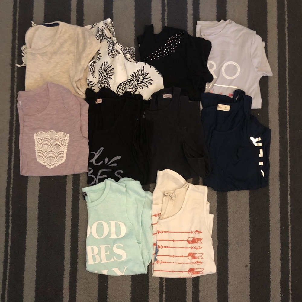 10 short sleeve shirts  (all are XS)